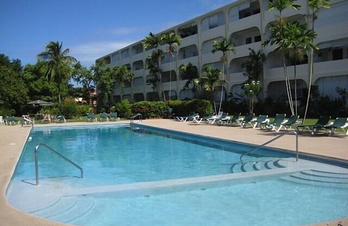 Halcyon Heights Apartment | Cool top floor 1 bed Apartment with Shared Pool and Beach Club Membership.