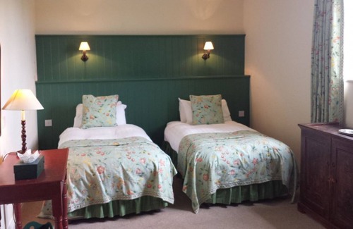 Whitchurch Cottage | Cotton Cottage has some unique features, including a Jacobean style turret.