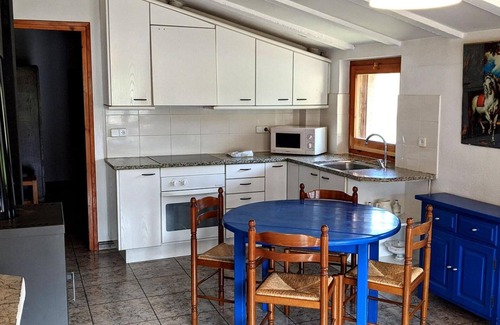 Santa Pau House | Country House 'Mas El Carrer - Baixos' with Mountain View, Shared Pool and Wi-Fi