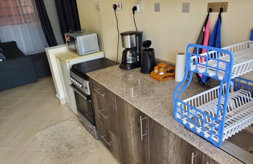 Nairobi Apartment | Cozy 1BR Retreat with Pool, Gym & WiFi in Leafy Serene Kitisuru, Nairobi