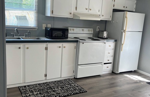 Virgie House | Cozy 2-bedroom mobile home centrally located on US 23 South with AC, WiFi