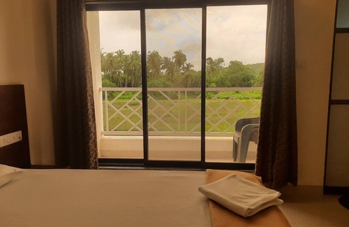 Murud Apartment | Cozy and rusting desined Paradise Farm Apartment near Kashid beach.