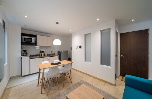 Financial District Apartment | Cozy Apartment in Zona G with Laundry Facilities