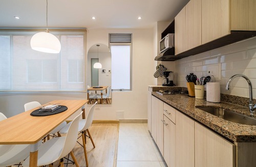 Financial District Apartment | Cozy Apartment in Zona G with Laundry Facilities