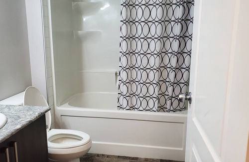 Northwest Calgary House | Cozy basement suite in a serene environment