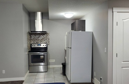 Northwest Calgary House | Cozy basement suite in a serene environment