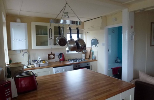 Clacton-on-Sea Ski Chalet | Cozy comfortable cottage by the sea and water, surrounded by fields and space