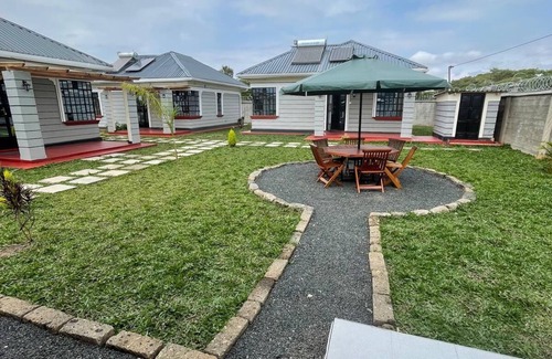 Nanyuki Cottage | Cozy cottage with free WiFi in charming Nanyuki with rooftop Mt. Kenya views.