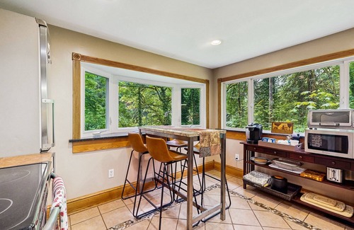 Washougal Cottage | Cozy Riverfront Cottage with Charming Interior & Hot Tub - Dog-Friendly