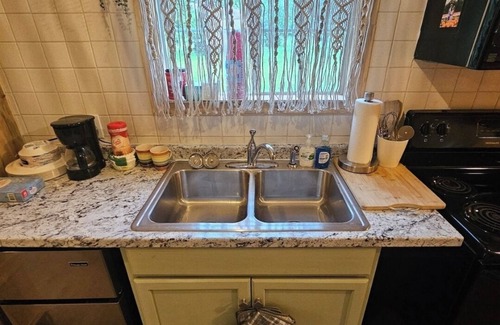 Leary Cabin | Cozy rustic tiny home! Just off of interstate 30, it's 5 minutes from Texarkana.