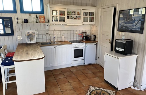 Boo Cabin | Cozy seaside cottage on its own jetty w rowing boat. 25 minutes to Stockholm!