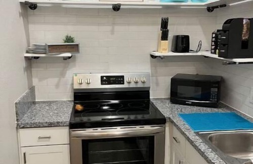 Brenham Apartment | Cozy tiny house on a farm with a large deck to watch the sunrise and sunset.!