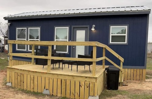 Brenham Apartment | Cozy tiny house on a farm with a large deck to watch the sunrise and sunset.!