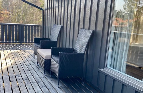 Arendal Cabin | Cozy vacation home in southern Norway (Tromøy, Arendal) with a boat and a pier.