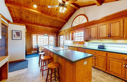 Easton House | Custom log home with wood stove, games, generous deck, & stunning mountain views