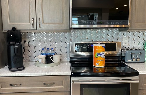 Apollo Beach House | Dazzling waterfront home with HEATED saltwater pool in Tampa Bay