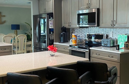 Apollo Beach House | Dazzling waterfront home with HEATED saltwater pool in Tampa Bay