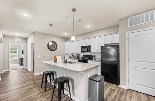 Interchange Square Condo | Deluxe and Spacious Condo w/Pool, Gym and Laundry