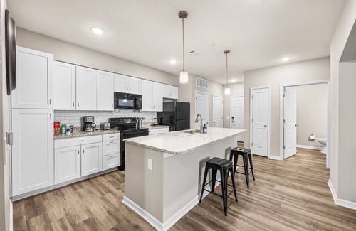 Interchange Square Condo | Deluxe and Spacious Condo w/Pool, Gym and Laundry