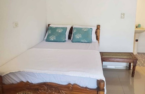 Playa San Diego Resort | Deluxe bedroom with 4 queen beds, accommodates 8 guests, located in El Tenis.