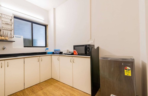 Borivali East Apartment | Deluxe Room with Kitchen