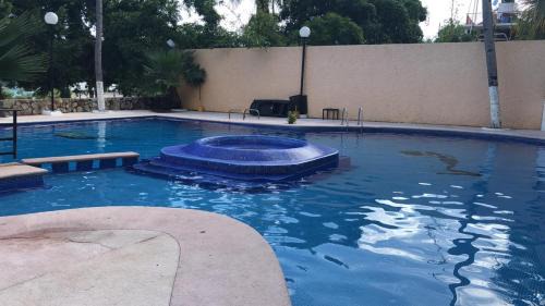 Caleta Apartment | Departamento con vista al mar, albercas y juegos