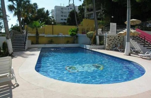 Caleta Apartment | Departamento con vista al mar, albercas y juegos