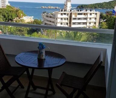 Caleta Apartment | Departamento con vista al mar, albercas y juegos