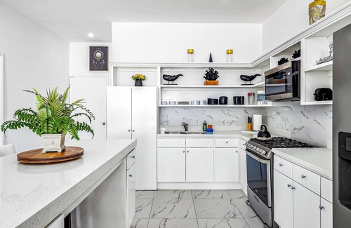 La Paloma House | Dog-friendly home 3 rows to beach with rooftop deck, pool, hot tub, & kitchen