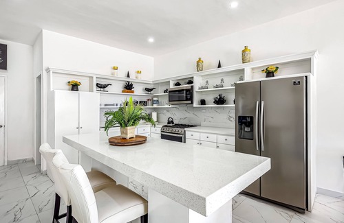 La Paloma House | Dog-friendly home 3 rows to beach with rooftop deck, pool, hot tub, & kitchen