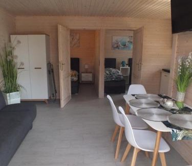 Firlej Resort | Domki letniskowe- Magnoliowa przystań