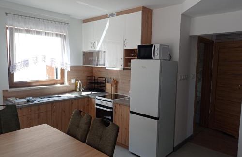 Stegna House | Domki u Eweli CAŁOROCZNE ogrzewane kominkiem