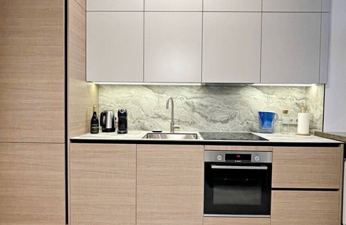 Kaunas Apartment | Downtown 4BD Master Apartment by Hostlovers