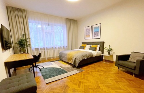 Kaunas Apartment | Downtown 4BD Master Apartment by Hostlovers