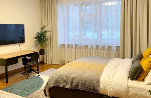 Kaunas Apartment | Downtown 4BD Master Apartment by Hostlovers