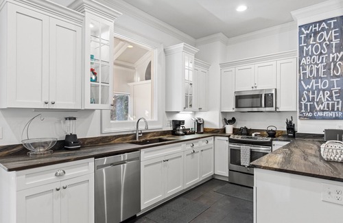 Old West Broad Neighborhood House | Downtown Retreat on Historic Jones Street | Heated Pool Access | By Southern Belle