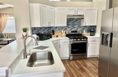 Crescent Lakes House | Dreamy Lakeview Villa with Heated Pool BBQ Family Friendly Near Disney