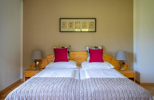 Rappitsch Bed & Breakfast | Dreibettzimmer mit Balkon und Seeblick - Pension Strauß