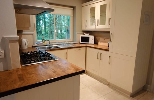 Kenmare Cottage | Dunkerron Woods 4 bedroom 4010 - sleeps 8 guests in 4 bedrooms