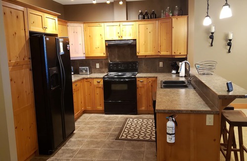 Snow Pine Estates Condo | Easy access Ski out condo with Hot Tub! Pet friendly.