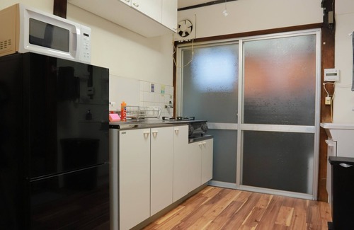 Konohana House | Easy access to USJ, Umeda and Namba! Maximum 10 people (4 bedrooms) Japanese style house! Children are welcome and there is a kids' space.