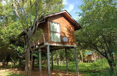 Sigiriya Apartment | Eco-friendly Eighth Wonder lodge bedroom resort with AC, Wi-Fi in Sigiriya