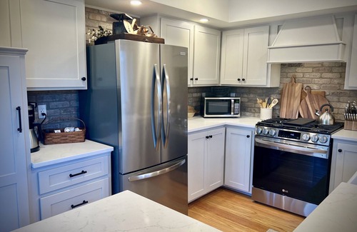 Edinboro Cottage | Edgewater Escape…Cozy waterfront cottage nestled in the center of Edinboro!