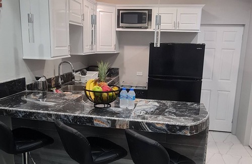 Tunapuna Apartment | El Rincón - Corazón latino, modern apartment which commands rest and relaxation.