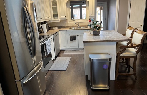 Saint Thomas House | Elegance, warmth and quietude set alongside the lush Lake Margaret Trails.