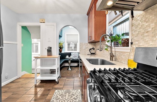 Kent House | Elegant French Tudor Retreat with Stunning City Views!