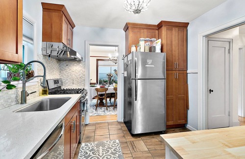 Kent House | Elegant French Tudor Retreat with Stunning City Views!