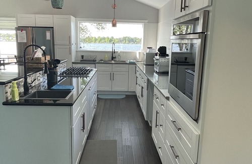 Tomah House | Elegant Lake Home with Hot Tub