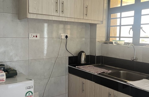 Juja Apartment | Elegant studio with WiFi ,Lift and fitness room in Juja town