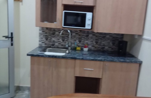 Mozambique House | Elite Guest House - Alojamento Familiar e Segurro na Matola